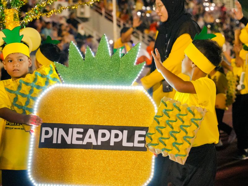 Children presenting a pineapple-themed costume during Annual Sports Day 2026